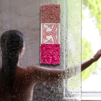 Back view of a naked woman in a shower cabin opening a window. Modern framless fixed glass panel, marble textured tile. Copy space, background.