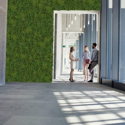 Business people talking in office corridor