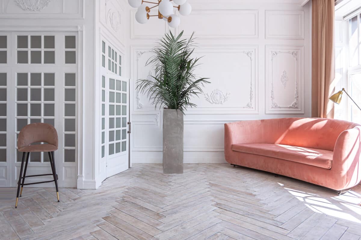 snow-white luxury apartment interior with Egyptian-style decor w